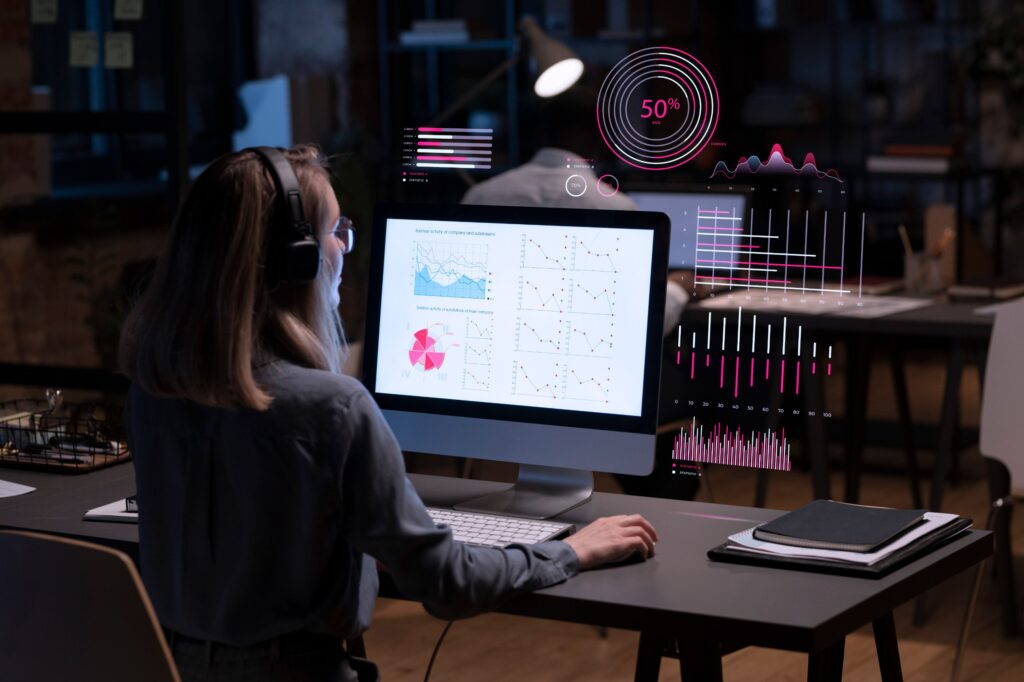 Person analyzing data visualizations on a computer - MaherTech Inc (Animation)